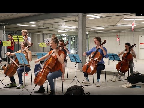 Orchestra USKO practices at Ikea parking lot