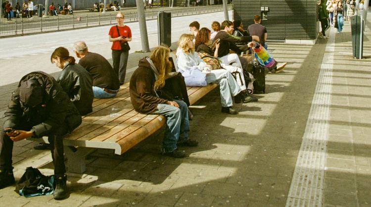 People waiting for the bus at Utrecht Central Station People waiting for the bus at Utrecht Central Station
